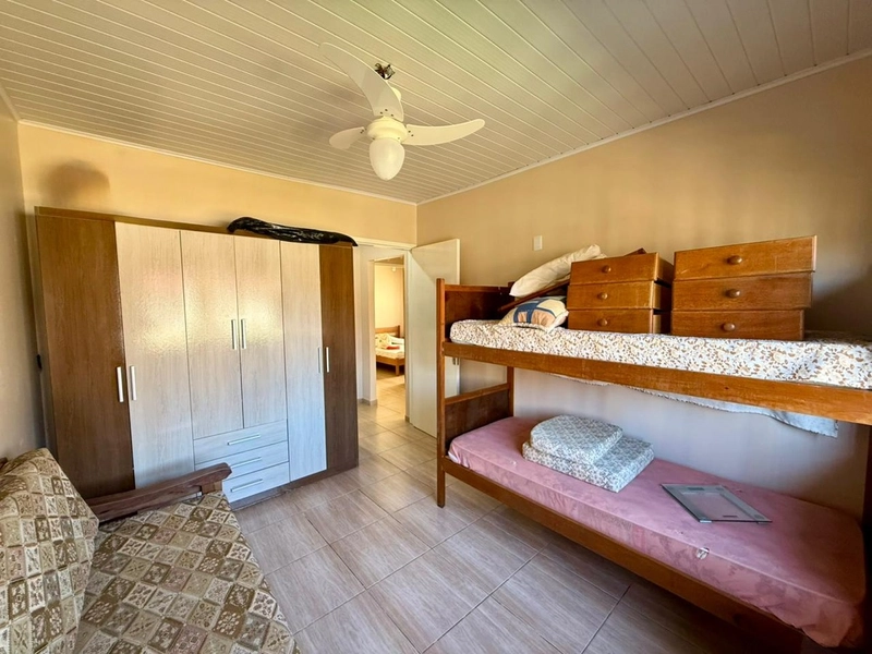 Casa 3 dormitórios próxima ao mar e ao comércio: 30ª foto da galeria de imagens do imóvel