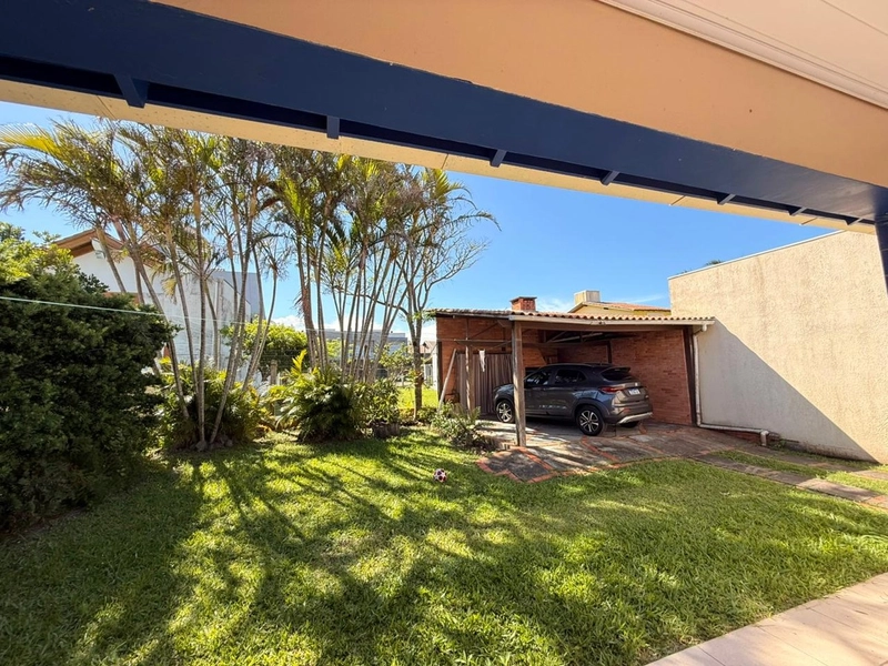 Casa 3 dormitórios próxima ao mar e ao comércio: 34ª foto da galeria de imagens do imóvel