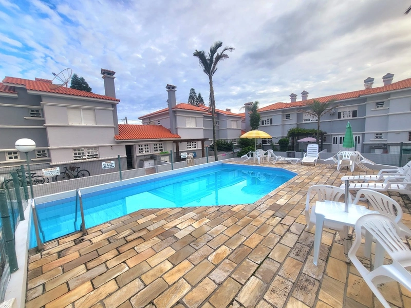 SOBRADO MOBILIADO COM PÁTIO E VARANDA A POUCOS METROS DO MAR: 26ª foto da galeria de imagens do imóvel