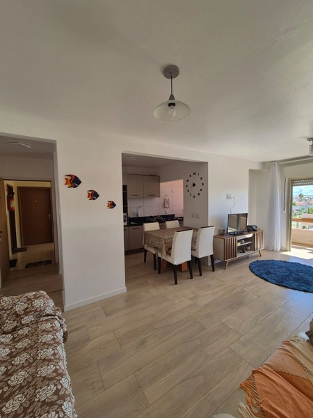 APARTAMENTO COM SACADA E CHURRASQUEIRA PERTINHO DO MAR: 5ª foto da galeria de imagens do imóvel