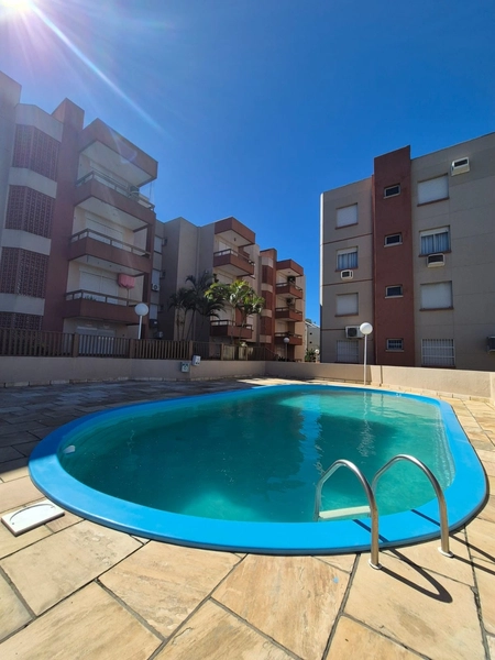 APARTAMENTO COM SACADA E CHURRASQUEIRA PERTINHO DO MAR: 14ª foto da galeria de imagens do imóvel