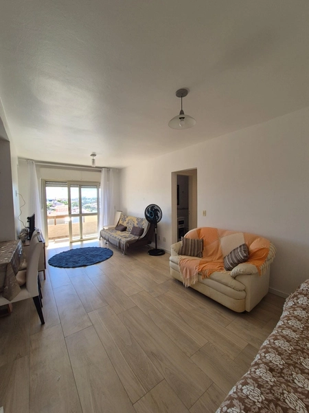 APARTAMENTO COM SACADA E CHURRASQUEIRA PERTINHO DO MAR: 7ª foto da galeria de imagens do imóvel