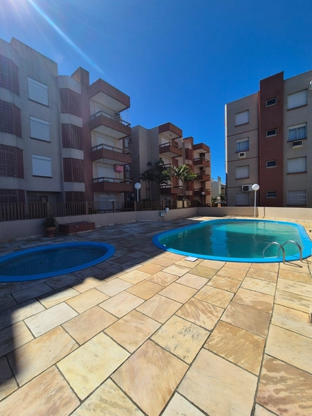 APARTAMENTO COM SACADA E CHURRASQUEIRA PERTINHO DO MAR: 13ª foto da galeria de imagens do imóvel