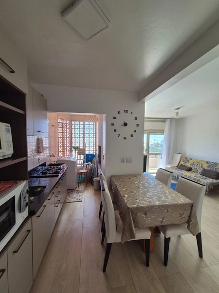 APARTAMENTO COM SACADA E CHURRASQUEIRA PERTINHO DO MAR: 6ª foto da galeria de imagens do imóvel