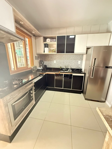 O sobrado está localizado no bairro Jardim Algarve tem 83 metros quadr: 10ª foto da galeria de imagens do imóvel