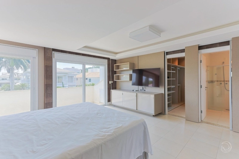 Linda casa em condomínio fechado em Cacupé: 22ª foto da galeria de imagens do imóvel