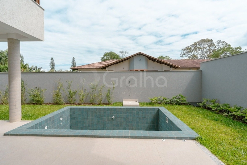 Casa em condomínio fechado em Cacupé com 4 suítes: 11ª foto da galeria de imagens do imóvel