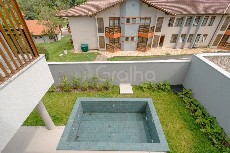Casa em condomínio fechado em Cacupé com 4 suítes: 29ª foto da galeria de imagens do imóvel