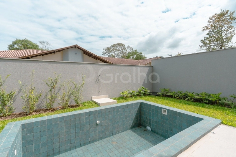Casa em condomínio fechado em Cacupé com 4 suítes: 12ª foto da galeria de imagens do imóvel