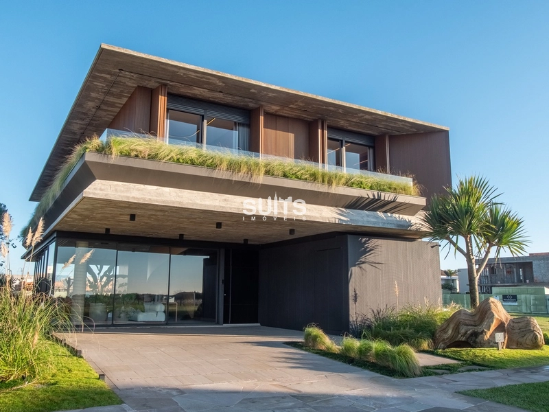 Belíssimo sobrado à venda no condomínio Los Cobos em Xangri-lá: 1ª foto da galeria de imagens do imóvel