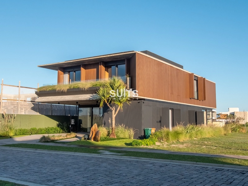 Belíssimo sobrado à venda no condomínio Los Cobos em Xangri-lá: 4ª foto da galeria de imagens do imóvel