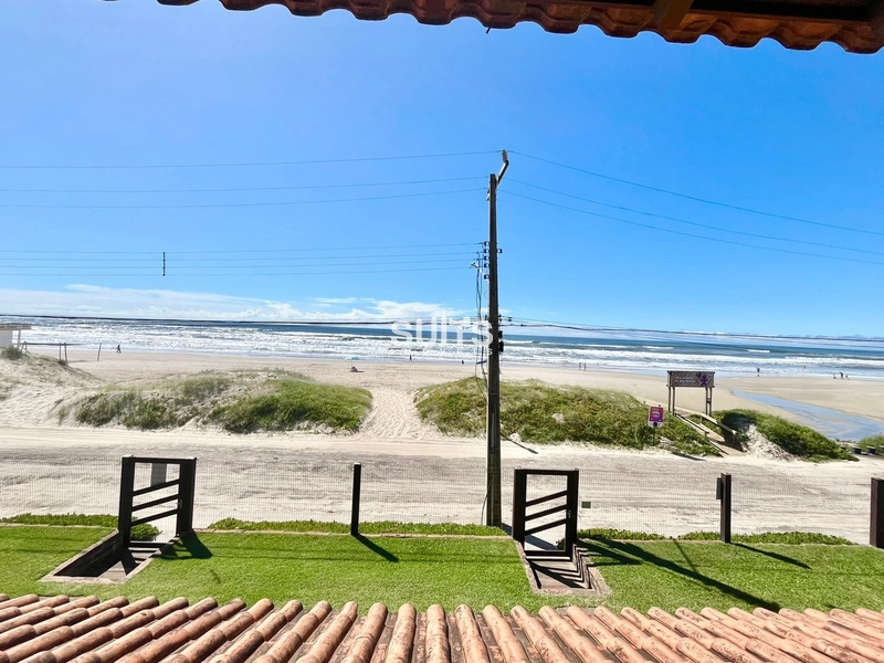 Excelente sobrado beira mar no centro de Xangri-Lá: 1ª foto da galeria de imagens do imóvel