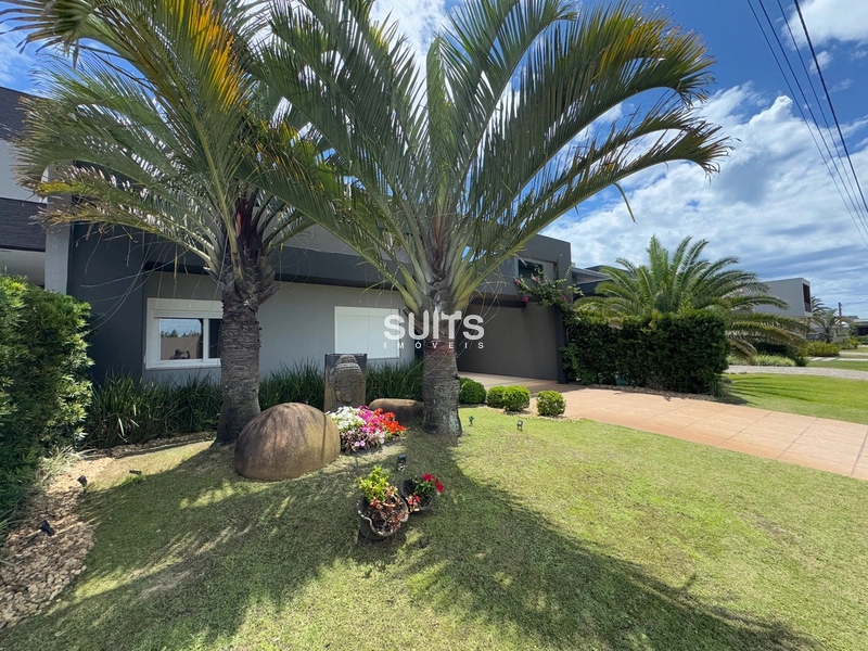 Linda casa no condomínio Riviera: 2ª foto da galeria de imagens do imóvel