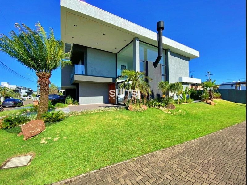 Belo sobrado de esquina no condomínio Blue em Xangri-Lá: 3ª foto da galeria de imagens do imóvel