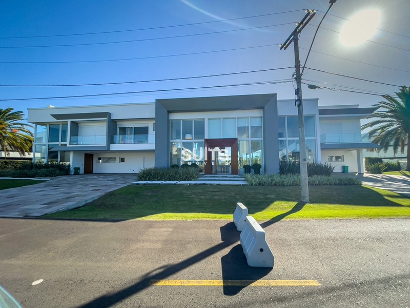 Mansão com 03 terrenos no condomínio Enseada: 3ª foto da galeria de imagens do imóvel