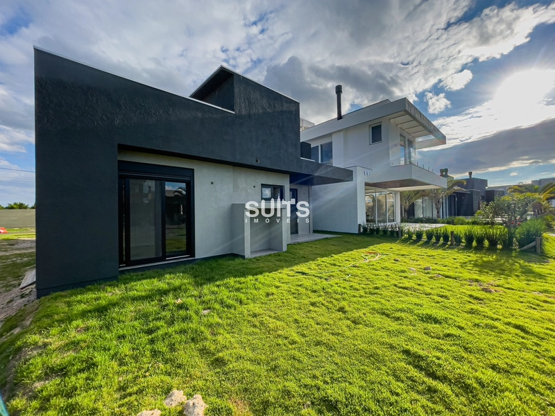 Incrível casa com linda vista para o lago no condomínio Riviera: 14ª foto da galeria de imagens do imóvel