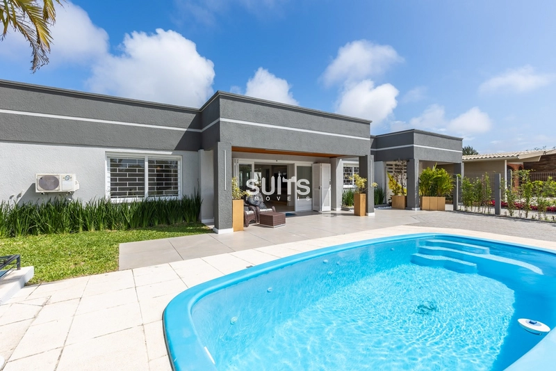 Belíssima casa em excelente localização na praia de Atlântida: 2ª foto da galeria de imagens do imóvel