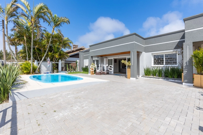 Belíssima casa em excelente localização na praia de Atlântida: 1ª foto da galeria de imagens do imóvel