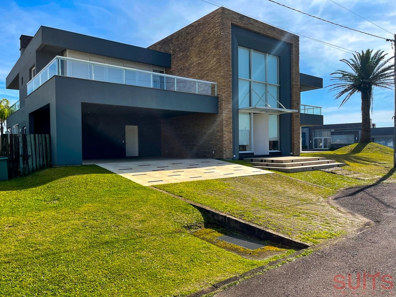 Ótimo sobrado com 02 terrenos à venda no condomínio Riviera: 2ª foto da galeria de imagens do imóvel