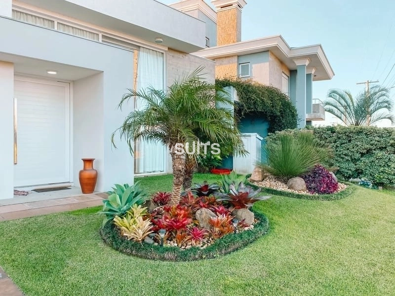 Excelente casa com uma linda área verde no Condomínio Rivieira: 2ª foto da galeria de imagens do imóvel