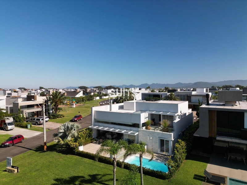 Excelente sobrado de esquina no condomínio Enseada: 7ª foto da galeria de imagens do imóvel