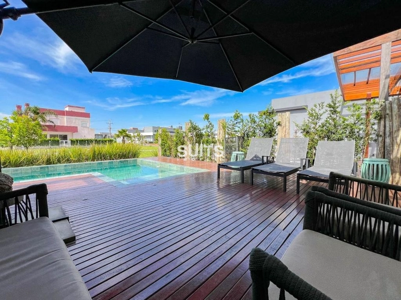 Excelente casa com fundos para área verde no condomínio Riviera: 23ª foto da galeria de imagens do imóvel