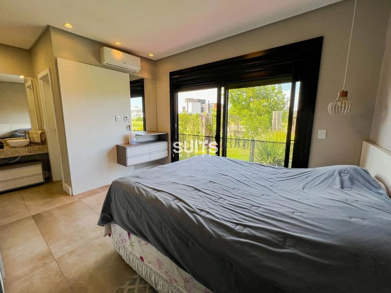 Excelente casa com fundos para área verde no condomínio Riviera: 39ª foto da galeria de imagens do imóvel