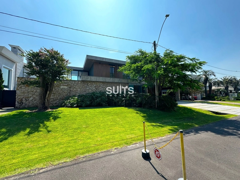 Mansão com 02 terrenos na beira do lago no cond. Bosques de Atlântida: 2ª foto da galeria de imagens do imóvel