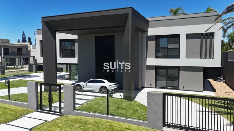 Mansão em região nobre na praia de Atlântida: 1ª foto da galeria de imagens do imóvel