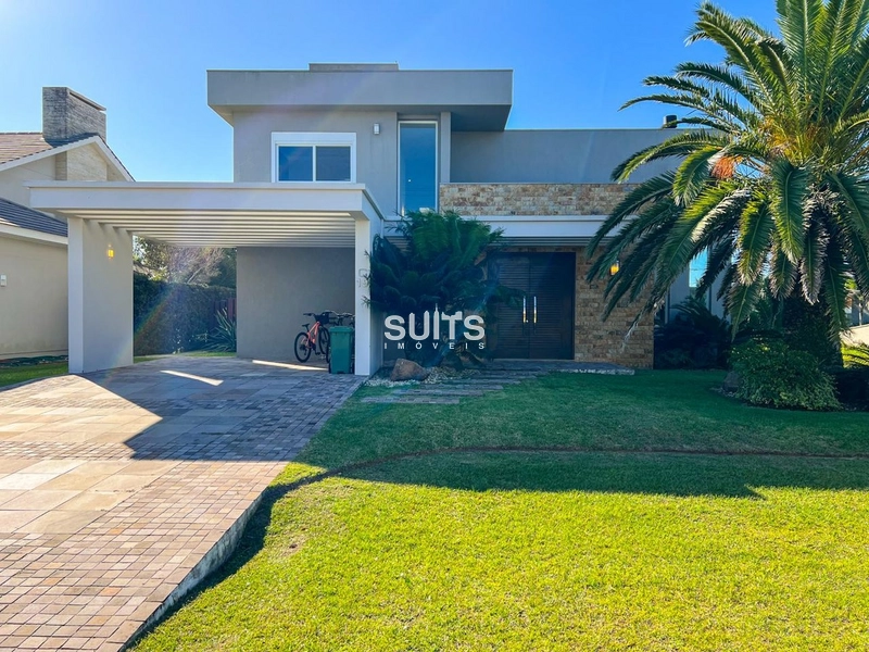 Excelente casa beira lago à venda no condomínio Ventura em Xangri-lá