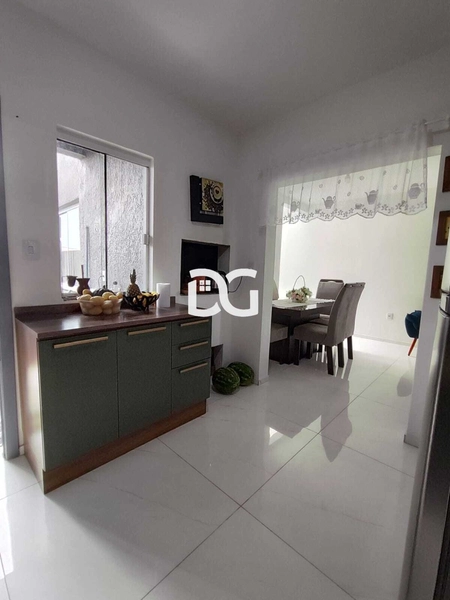 Casa aconchegante e bem distribuída, composta por 3 dormitórios: 10ª foto da galeria de imagens do imóvel