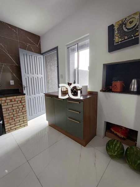 Casa aconchegante e bem distribuída, composta por 3 dormitórios: 11ª foto da galeria de imagens do imóvel