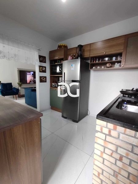 Casa aconchegante e bem distribuída, composta por 3 dormitórios: 9ª foto da galeria de imagens do imóvel