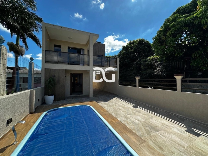 Casa moderna e aconchegante, composta por 3 suítes amplas.: 2ª foto da galeria de imagens do imóvel