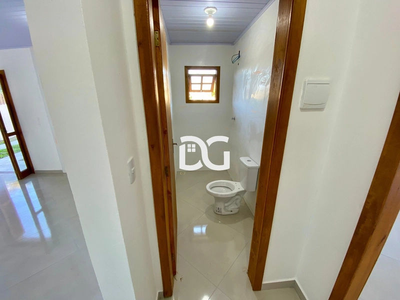 Casa aconchegante e bem distribuída, ideal para quem busca conforto: 13ª foto da galeria de imagens do imóvel