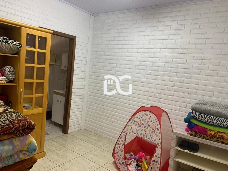 Casa aconchegante com duas suítes amplas, proporcionando conforto: 9ª foto da galeria de imagens do imóvel