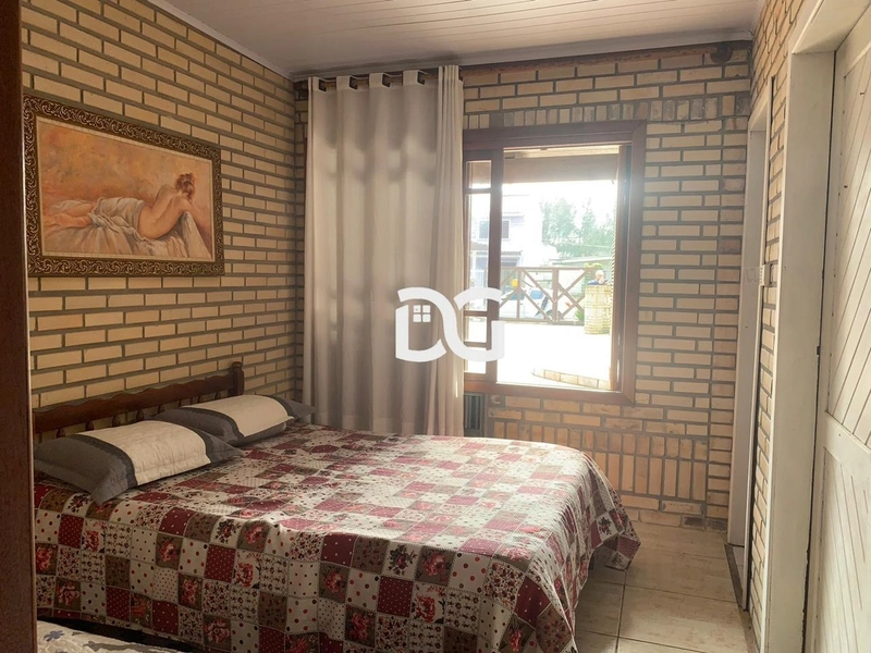 Casa aconchegante com duas suítes amplas, proporcionando conforto: 11ª foto da galeria de imagens do imóvel