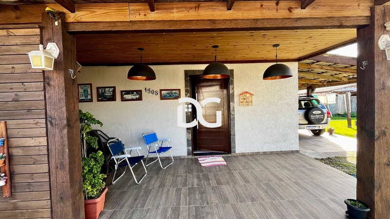 Casa aconchegante composta por 2 dormitórios: 1ª foto da galeria de imagens do imóvel