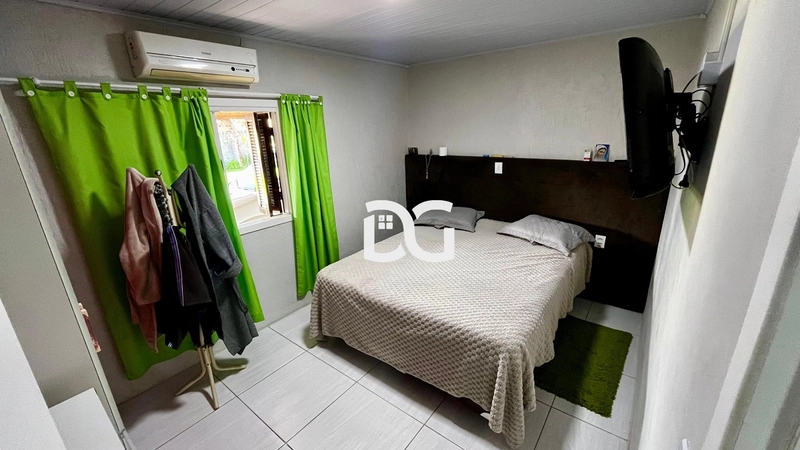 Casa aconchegante composta por 2 dormitórios: 10ª foto da galeria de imagens do imóvel