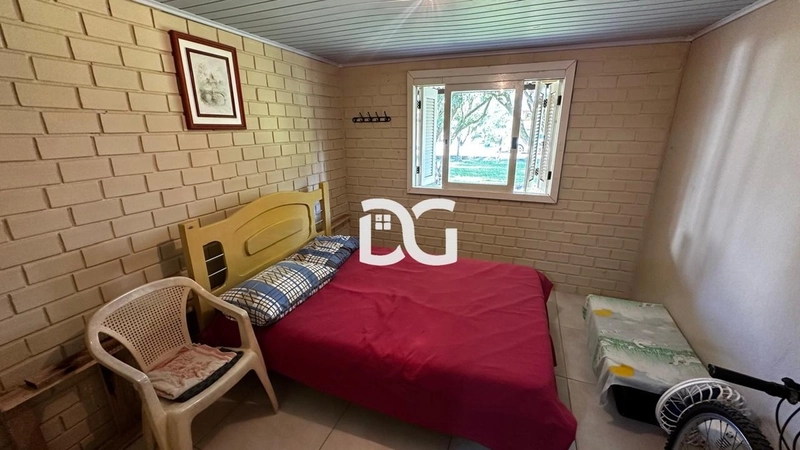 Casa ampla e bem distribuída, composta por 3 dormitórios confortáveis: 12ª foto da galeria de imagens do imóvel