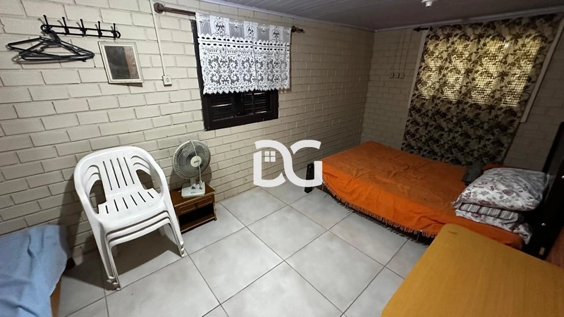 Casa ampla e bem distribuída, composta por 3 dormitórios confortáveis: 13ª foto da galeria de imagens do imóvel