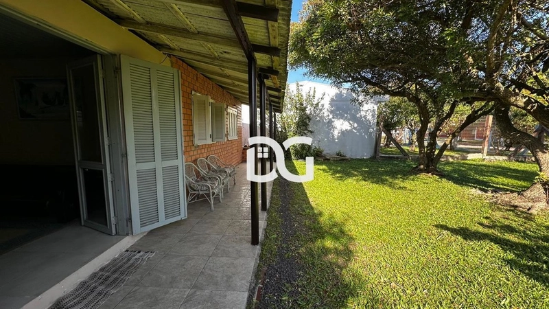 Casa ampla e bem distribuída, composta por 3 dormitórios confortáveis: 5ª foto da galeria de imagens do imóvel
