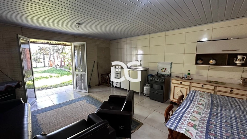 Casa ampla e bem distribuída, composta por 3 dormitórios confortáveis: 10ª foto da galeria de imagens do imóvel