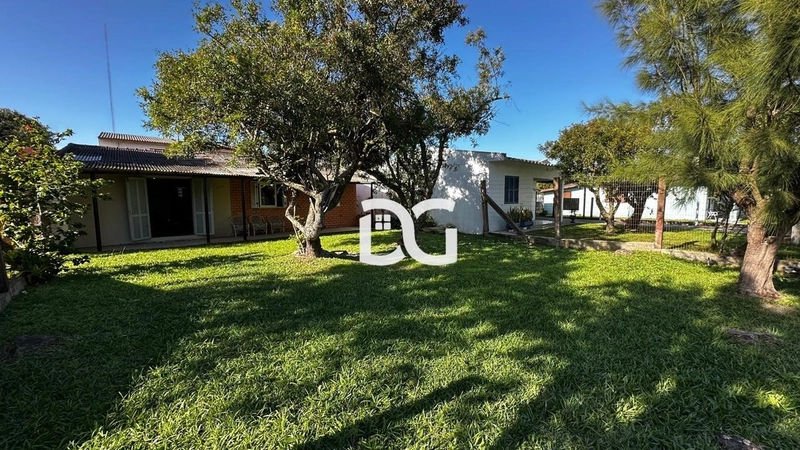 Casa ampla e bem distribuída, composta por 3 dormitórios confortáveis: 4ª foto da galeria de imagens do imóvel