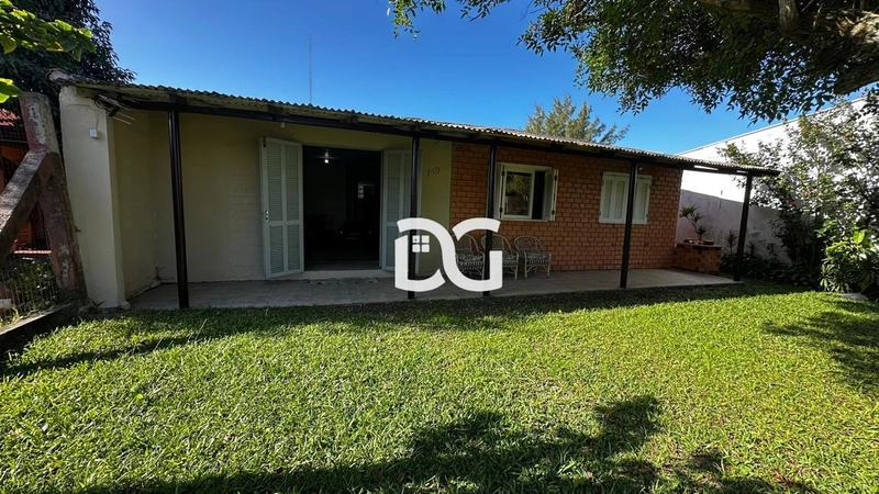 Casa ampla e bem distribuída, composta por 3 dormitórios confortáveis: 3ª foto da galeria de imagens do imóvel