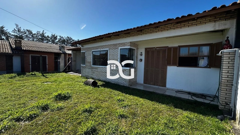 Casa aconchegante composta de 3 dormitórios + anexo com 1 dormitório: 1ª foto da galeria de imagens do imóvel
