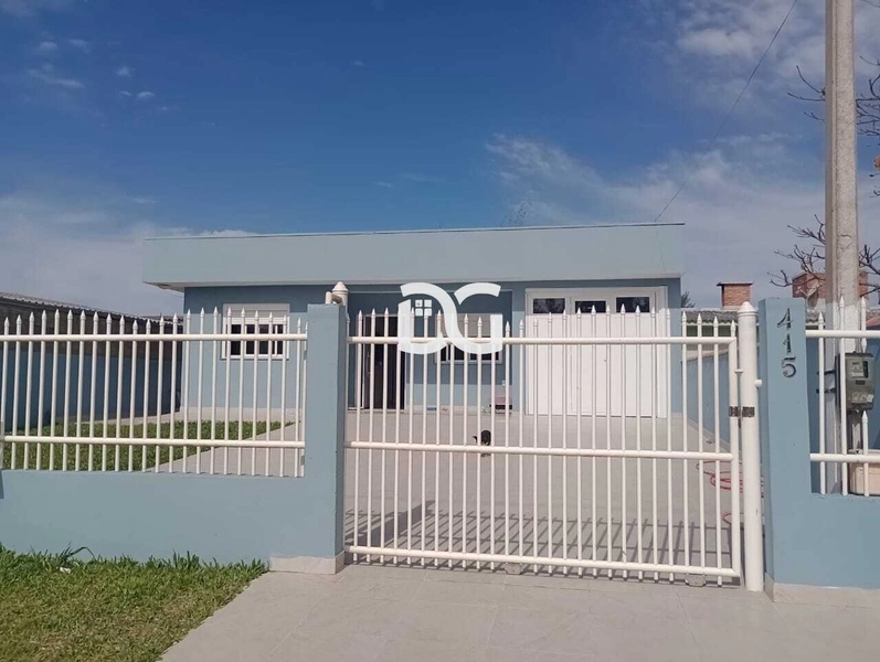 Casa acolhedora composta por 2 dormitórios bem distribuídos: 1ª foto da galeria de imagens do imóvel