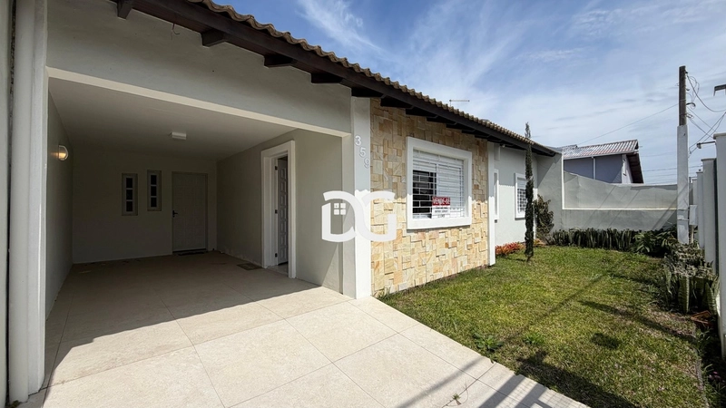 Casa composta por 3 dormitórios, sendo 1 suíte no centro