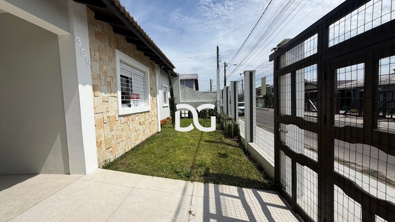 Casa composta por 3 dormitórios, sendo 1 suíte no centro: 4ª foto da galeria de imagens do imóvel