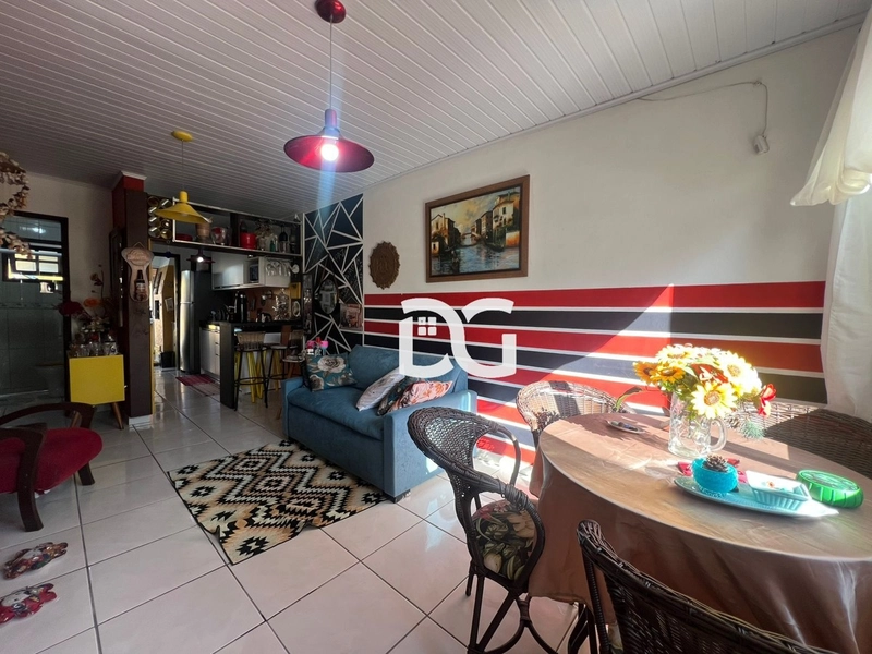 Casa aconchegante composta de 2 dormitórios: 1ª foto da galeria de imagens do imóvel